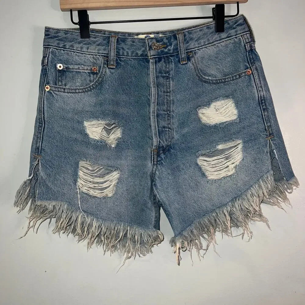 Free people baggy tomboy distressed denim shorts size 25